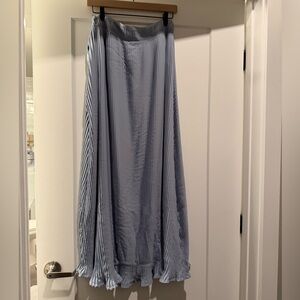 Pleated periwinkle blue maxi A-Line skirt with slightly ruffled bottom